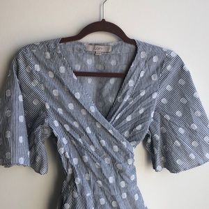 Light blue wrap tie blouse